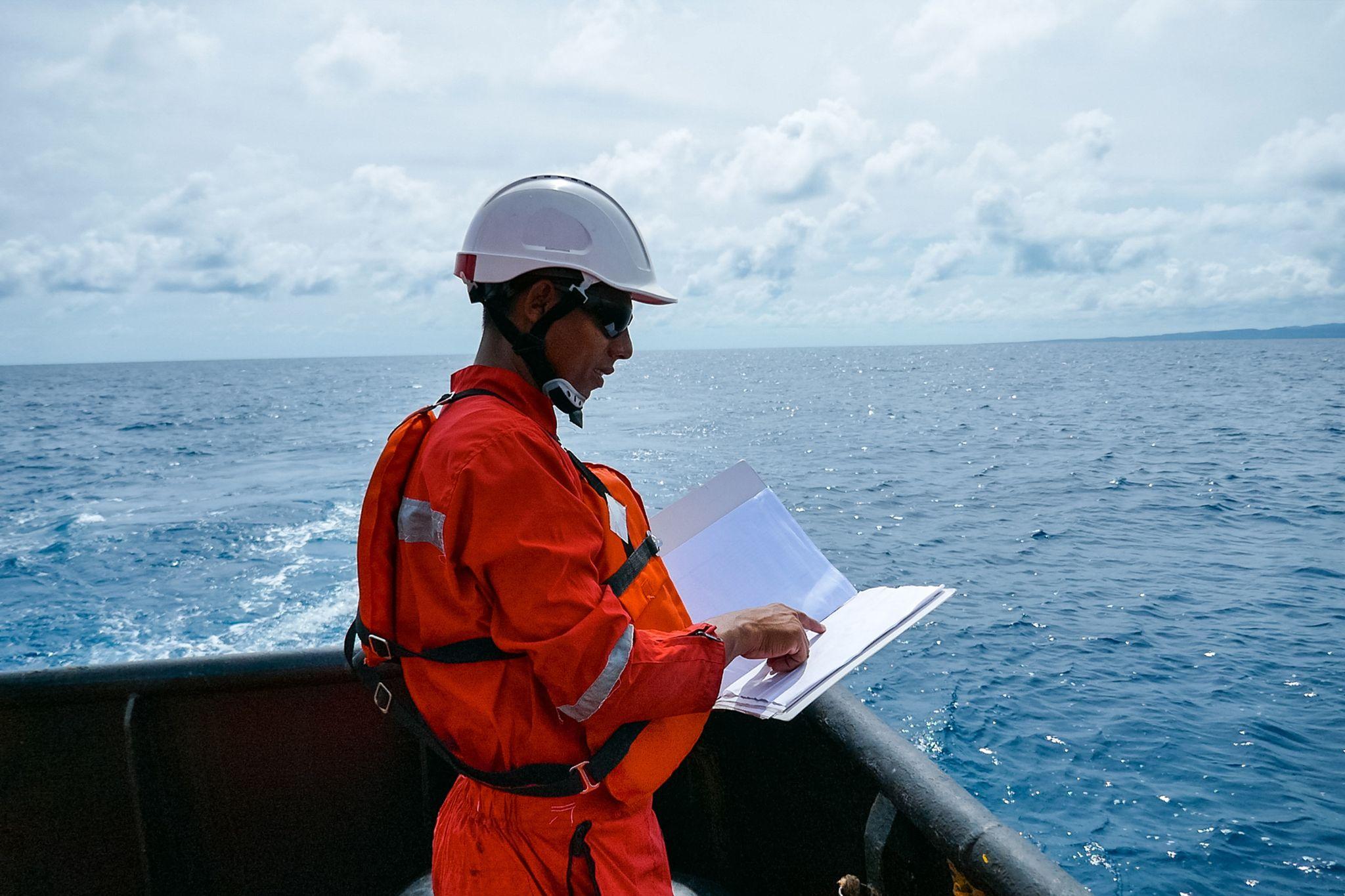 safety-officer-standing-on-an-industrial-ship