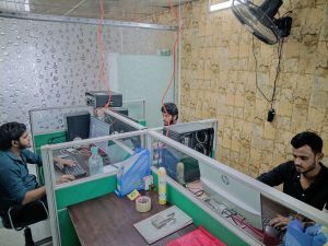 VMES office staff working computer emails client communication Strand Road Chattogram