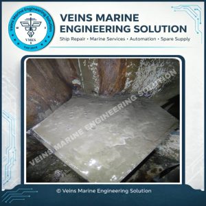 Internal steel containment box with cementing arrangement inside MV Vosco Prosper bulbous bow during temporary collision repair